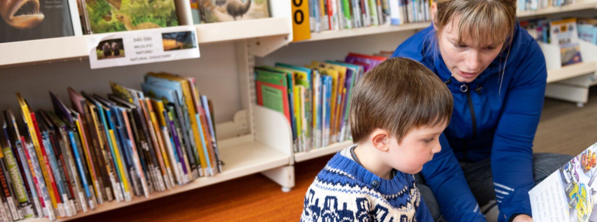 Mother Reads to Son